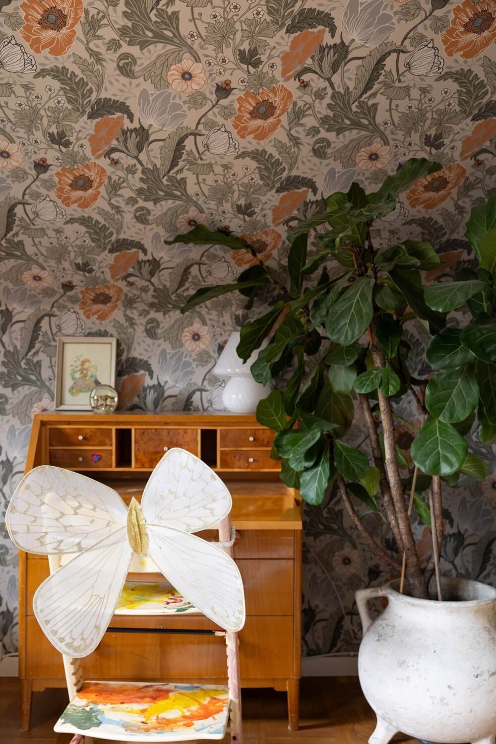 A Swedish Family House with Wall Murals and Art 18 kids room with floral wallpaper and vintage desk