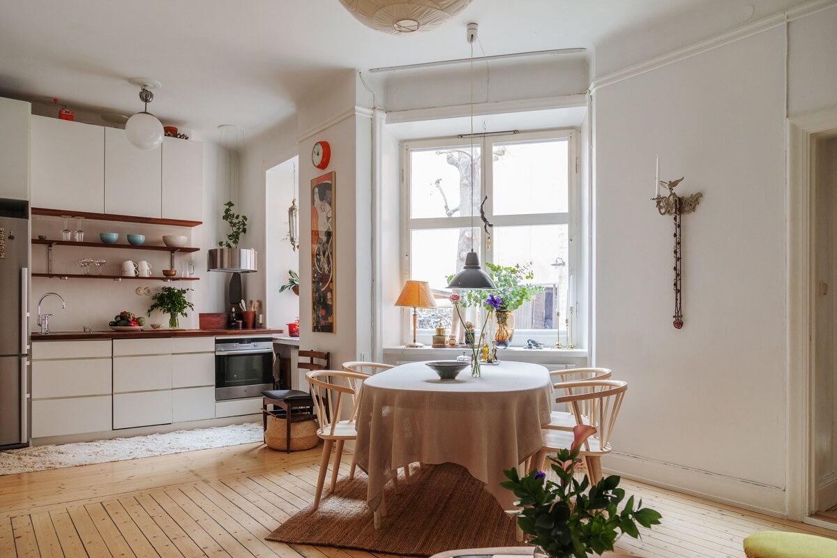 Period Details and Light Rooms in a Scandinavian Apartment 7 kitchen dining space