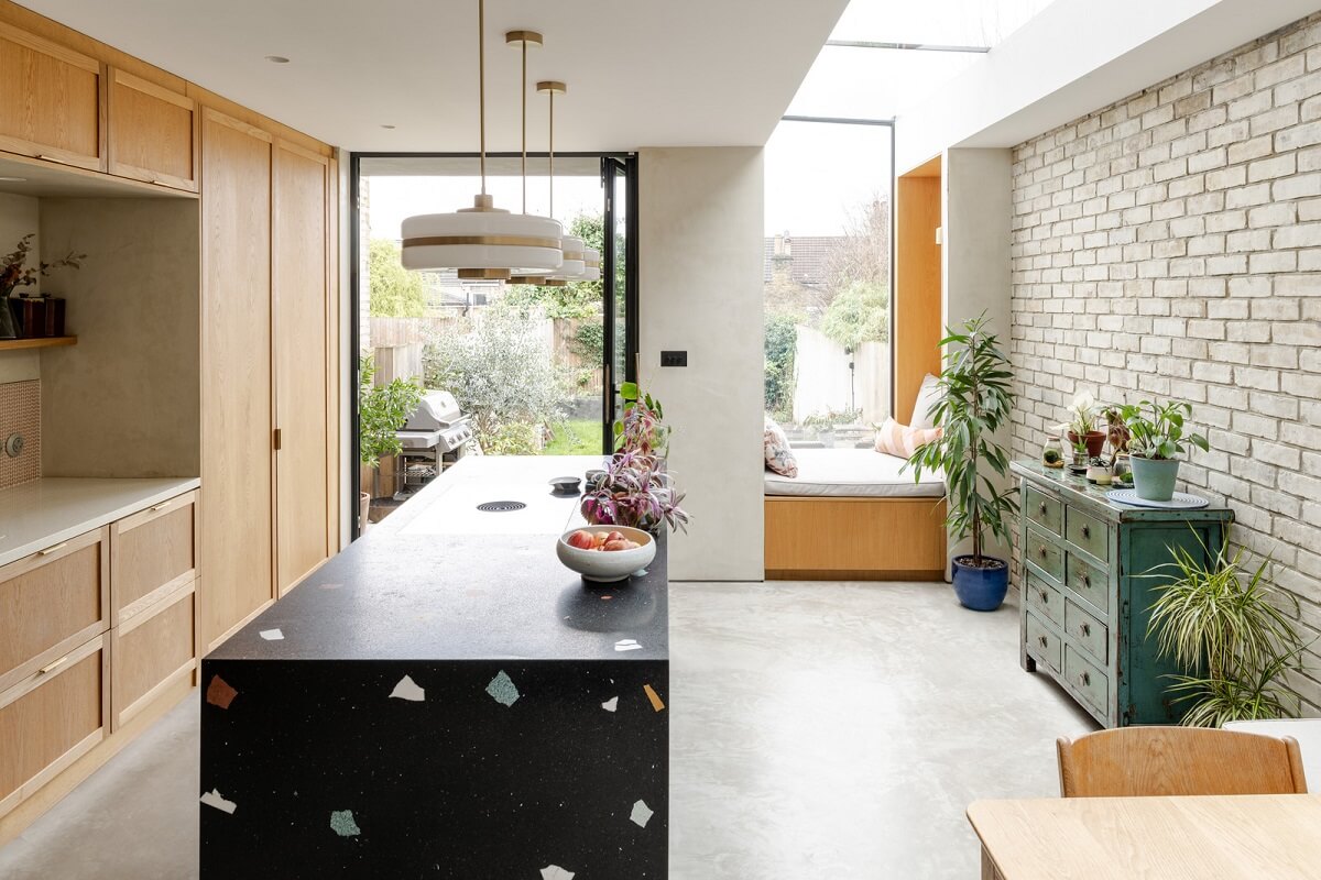 31 Practical Kitchen Flooring Ideas For Your Home 17 kitchen extension oak cabinets and black terrazzo island