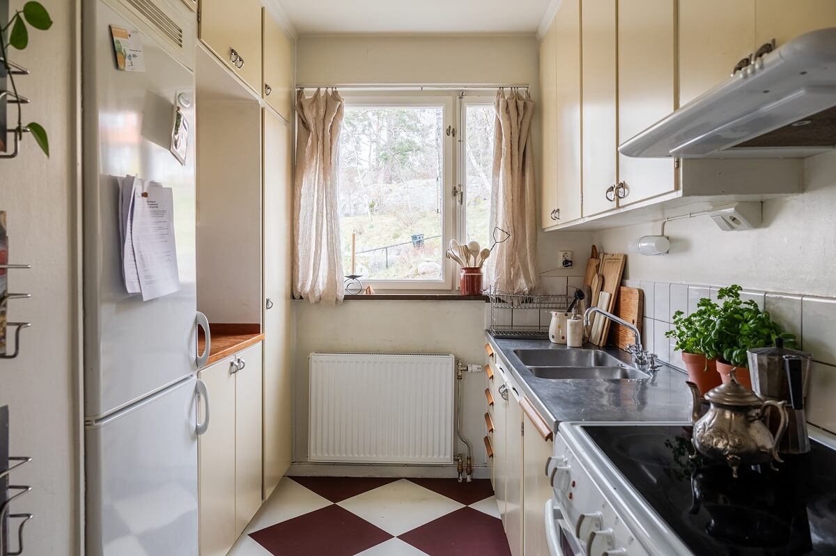 A Swedish Family House with Wall Murals and Art 11 kitchen with checkerboard floor