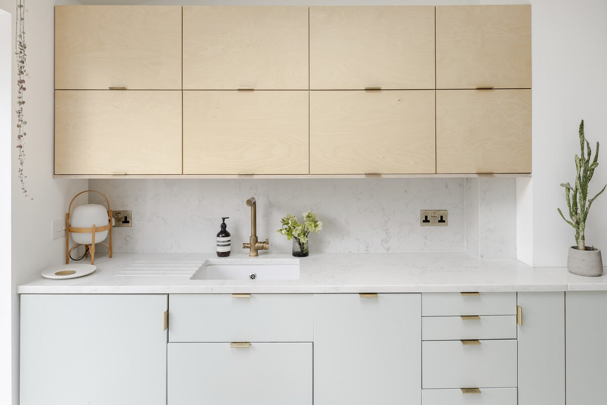 Light and Modern Spaces in a Small Victorian House 11 kitchen with light gray cabinets