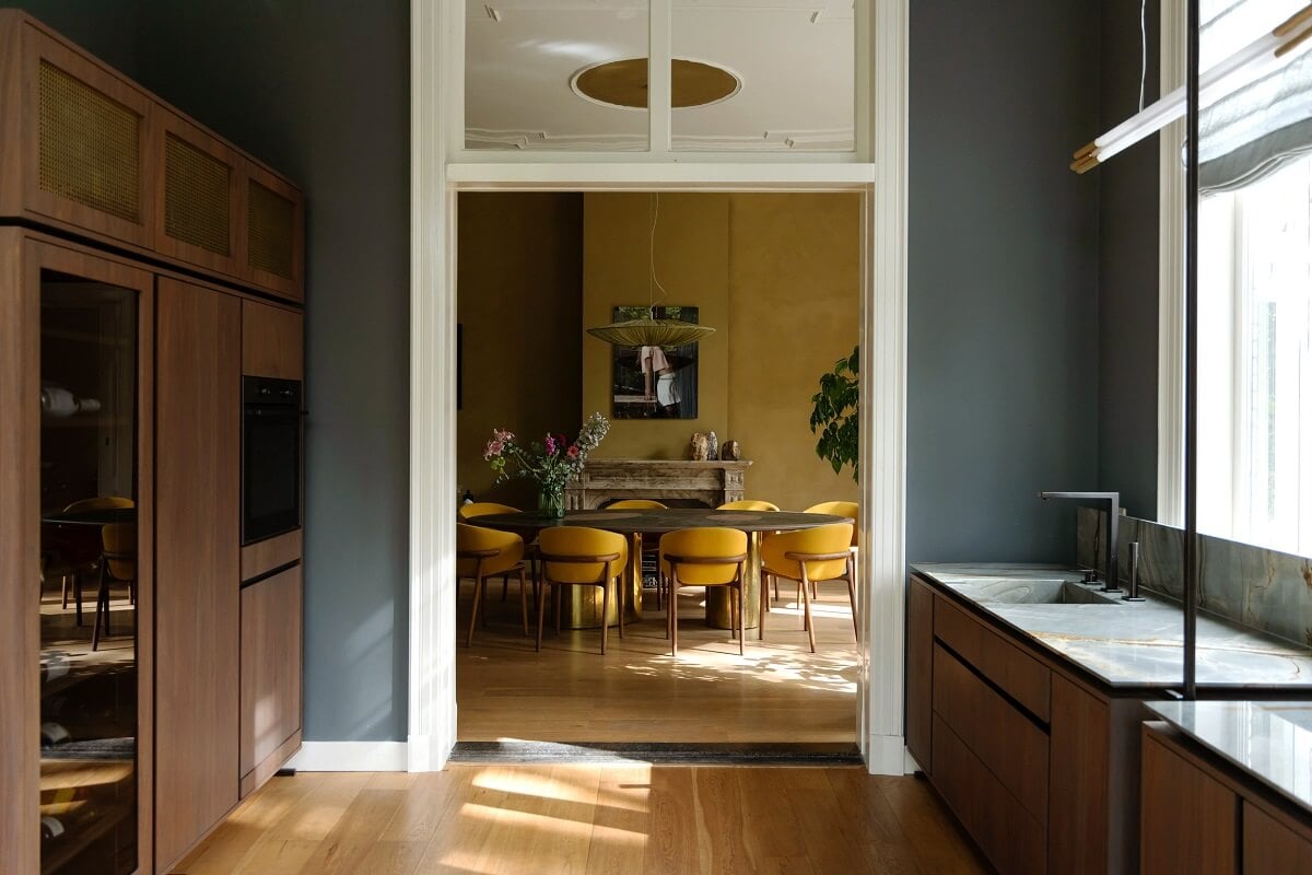 A Warm Atmosphere in a Historic Dutch Villa 8 kitchen with walnut cabinets