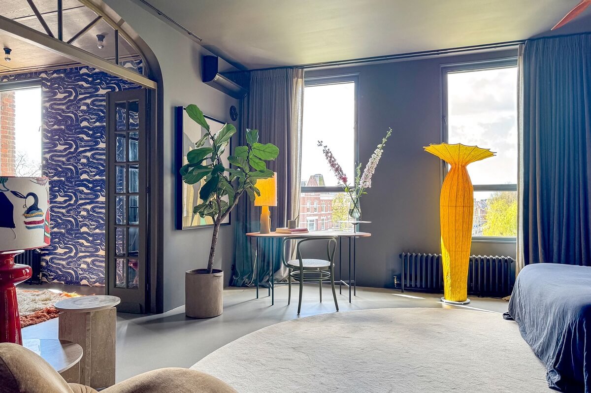 Color and Graphic Design in the Home of a Dutch Interior Stylist 25 large master bedroom with desk