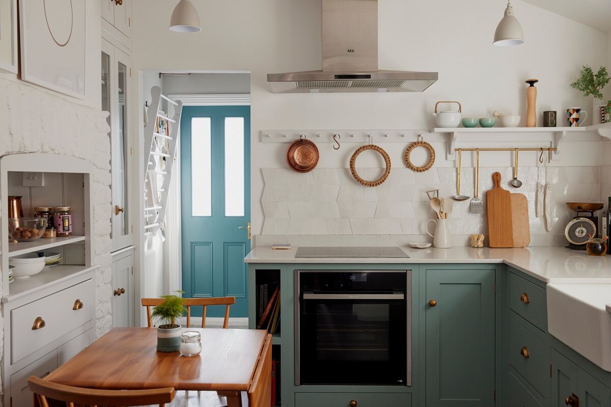 light blue devol kitchen with small dining table