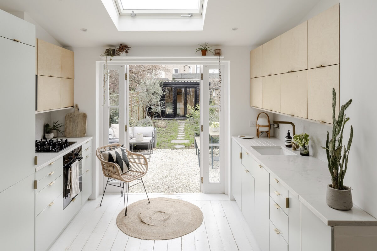 Light and Modern Spaces in a Small Victorian House 10 light kitchen with skylight
