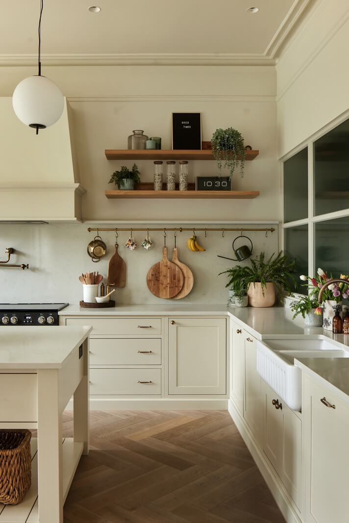 Historic Features and Modern Design in an English Regency Villa 5 light kitchen with wooden shelves and butler sink