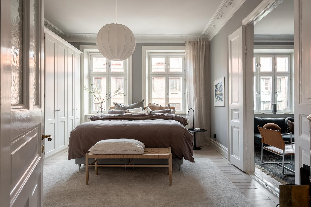 A Stylish Light Gray Swedish Apartment 16 light master bedroom with wardrobes