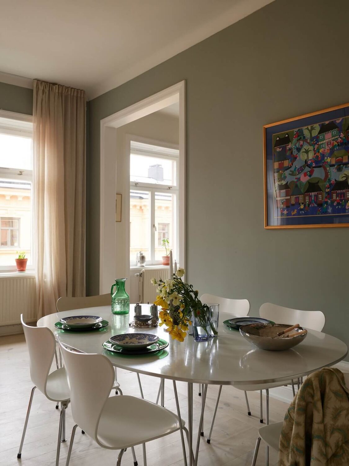 A Green Kitchen in a Gray Family Apartment 7 living room dining table