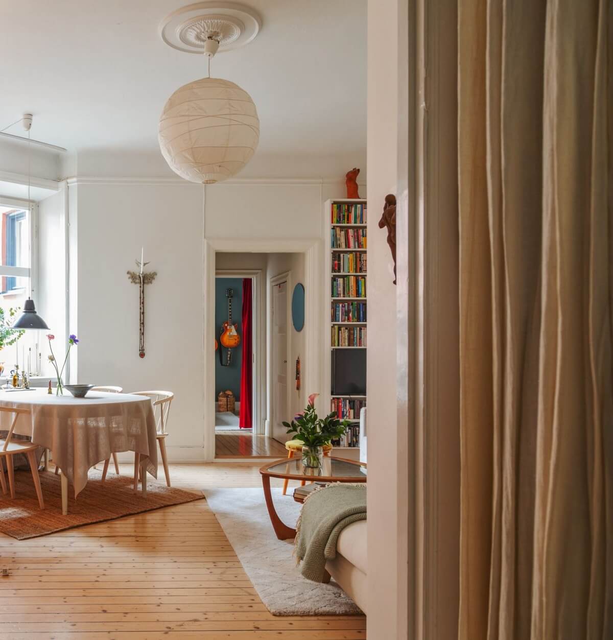 Period Details and Light Rooms in a Scandinavian Apartment 6 living room view