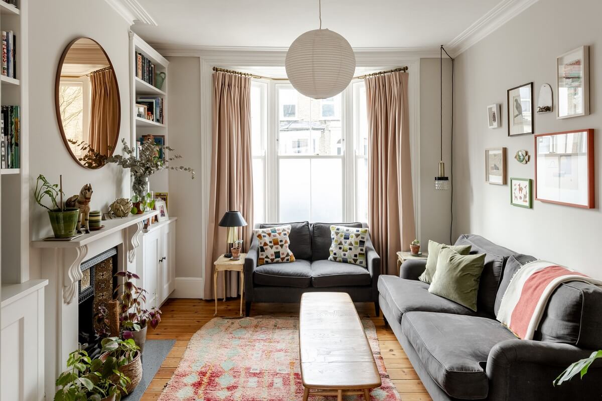 A Light London Family House with a Modern Extension 1 living room with bay window fireplace and pine floorboards