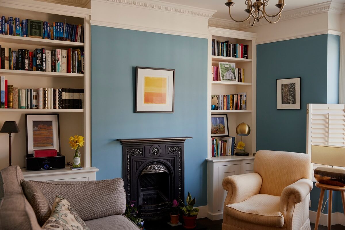 A London Maisonette with A Light Blue deVOL Kitchen 6 living room with blue walls fireplace and bookcases