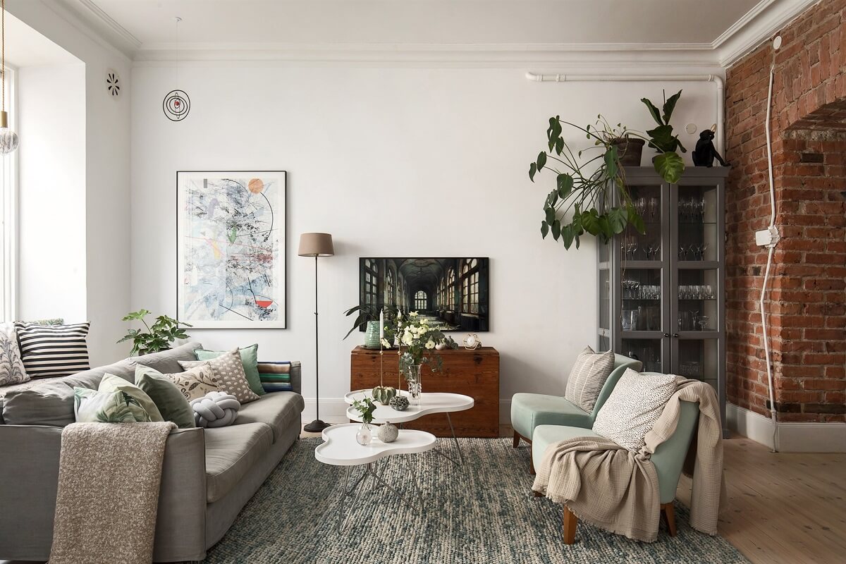 A Swedish Apartment with an Exposed Brick Wall 7 living room with brick wall
