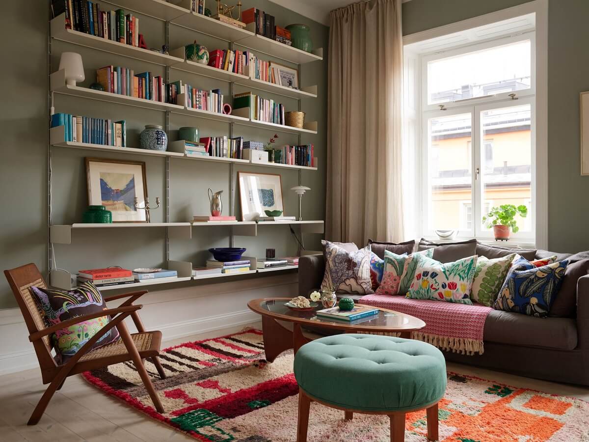 A Green Kitchen in a Gray Family Apartment 3 living room with colorful rug