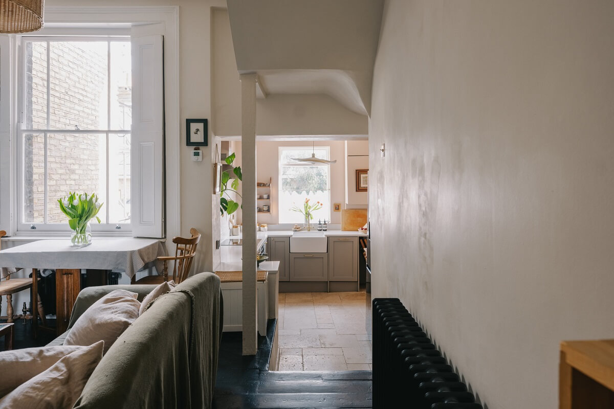 A Small London Apartment Filled with Books 7 living room with dark wooden floor