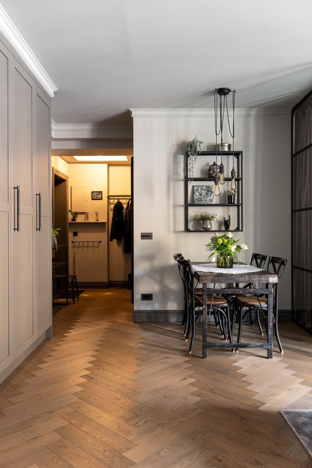 A Gray Apartment with an Industrial Glass Bedroom 17 living room with floor to ceiling cabinets