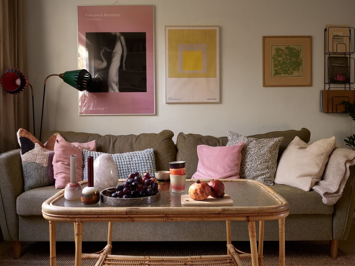 A Swedish Apartment with a Tiny Terracotta Brown Bedroom 4 living room with pastel pink details