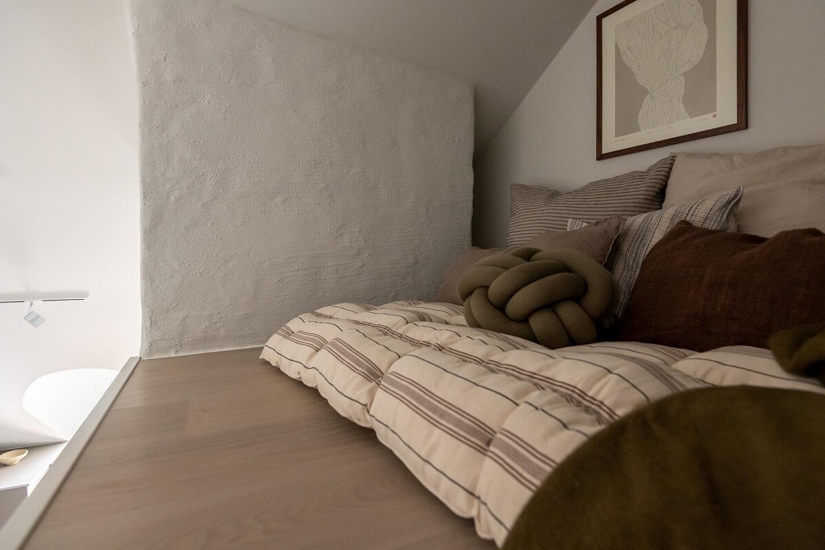 An Attic Studio Apartment with a Glass Room Divider 18 loft space