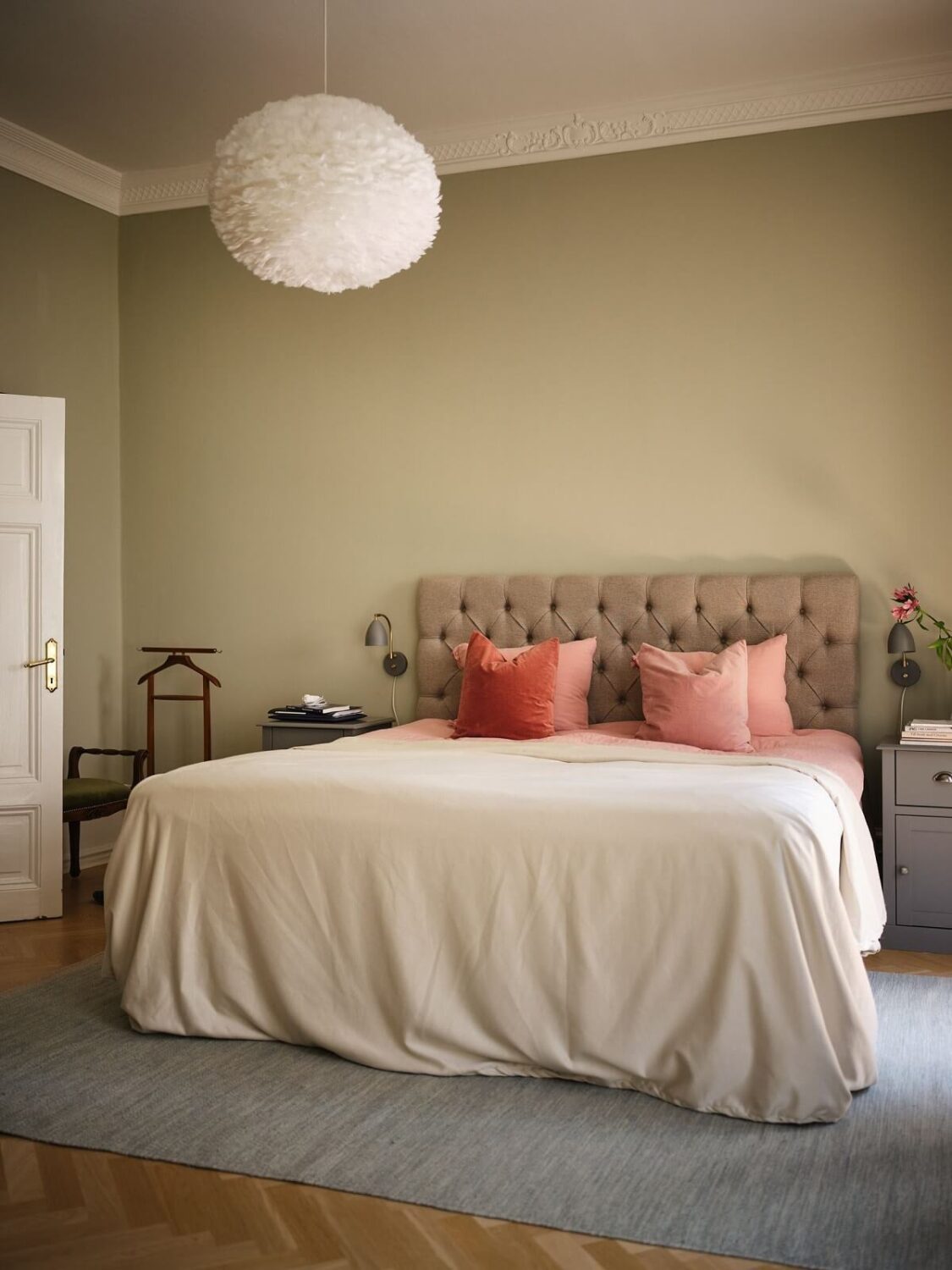 A Classic Stockholm Apartment with Floral Wallpaper 19 master bedroom with calm gray green walls nordroom