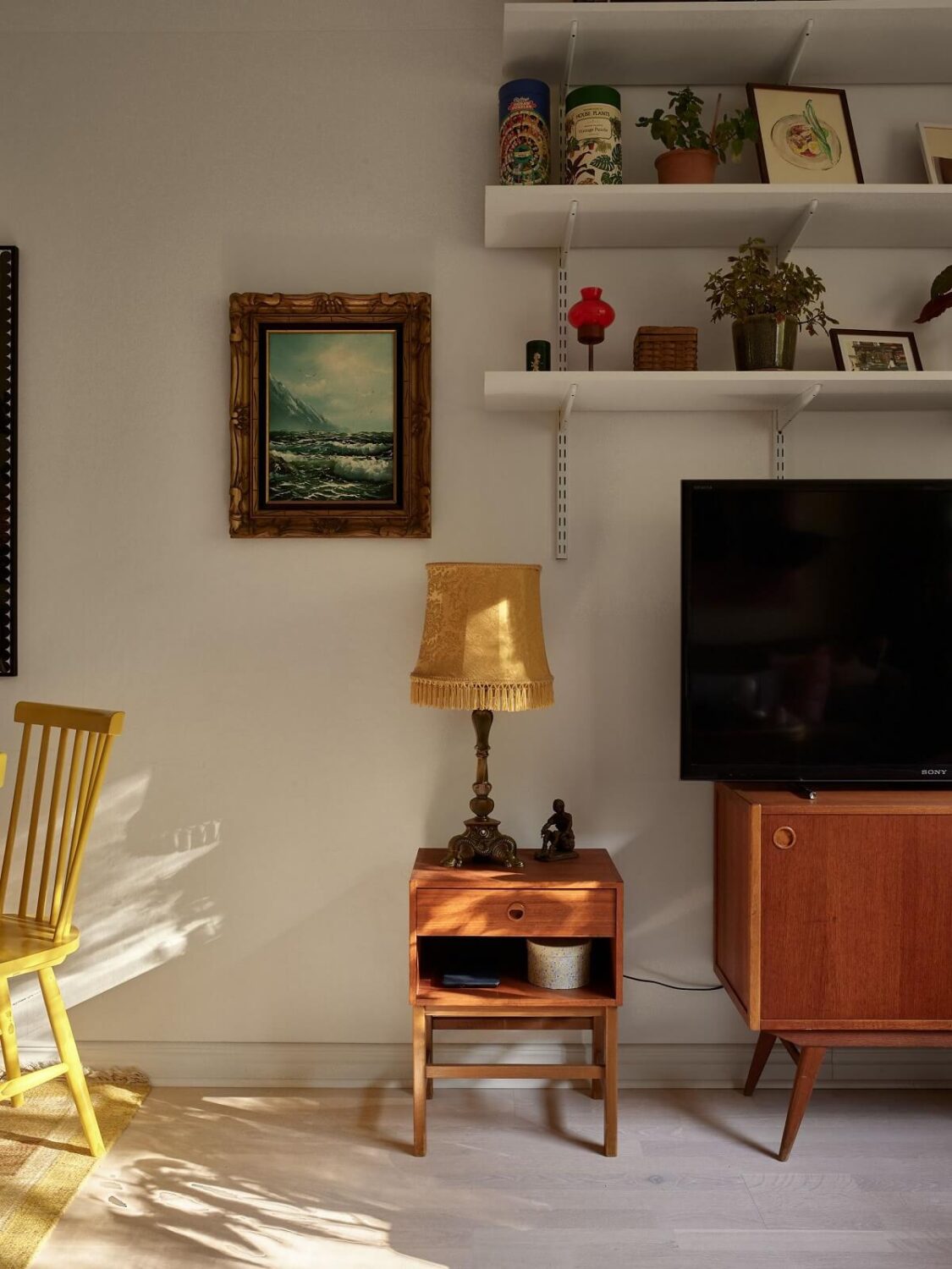 A Swedish Apartment with a Tiny Terracotta Brown Bedroom 6 midcentury cabinet