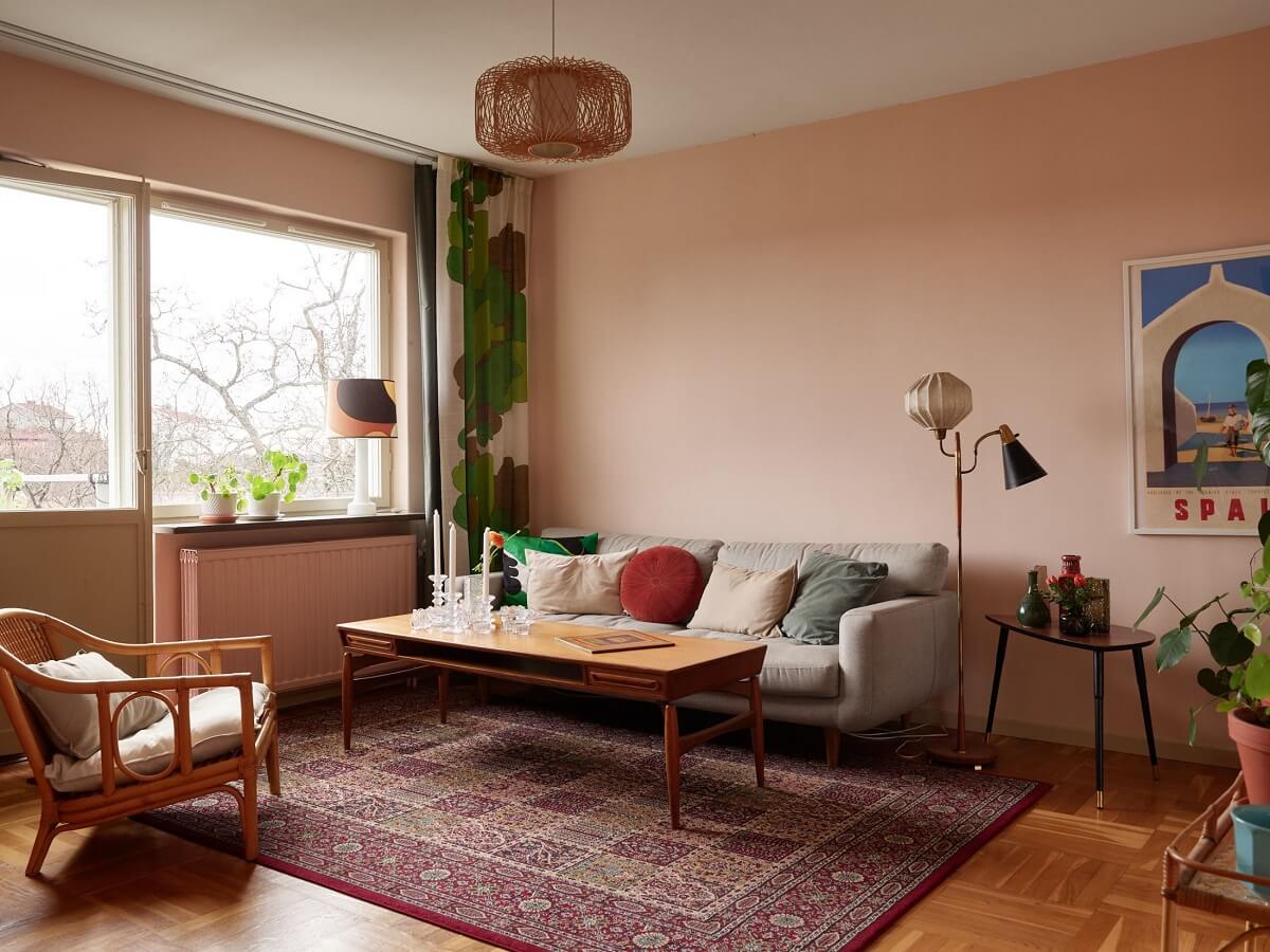 Revisiting a Small Green and Pink Midcentury Apartment 10 midcentury living room with light pink walls