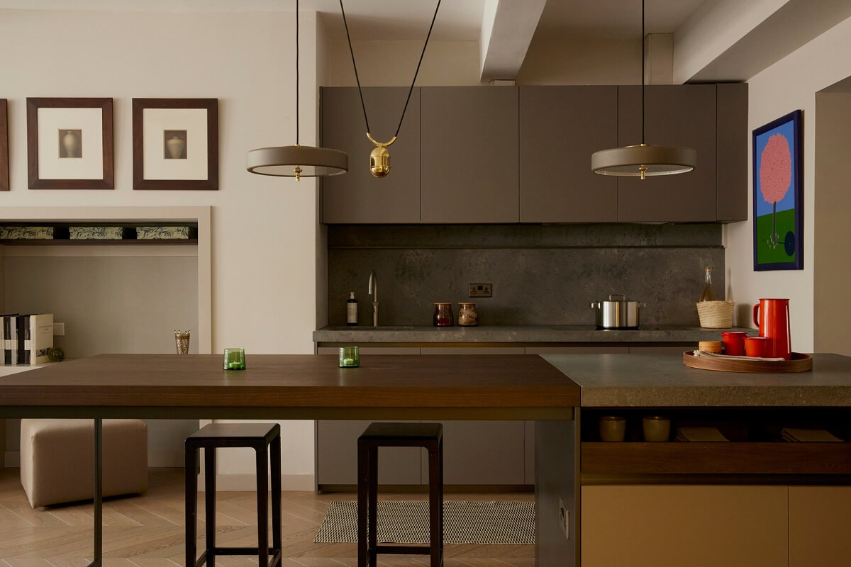 Modern Interiors in an Architectural 19th Century Building 5 modern kitchen with gray cabinets and island