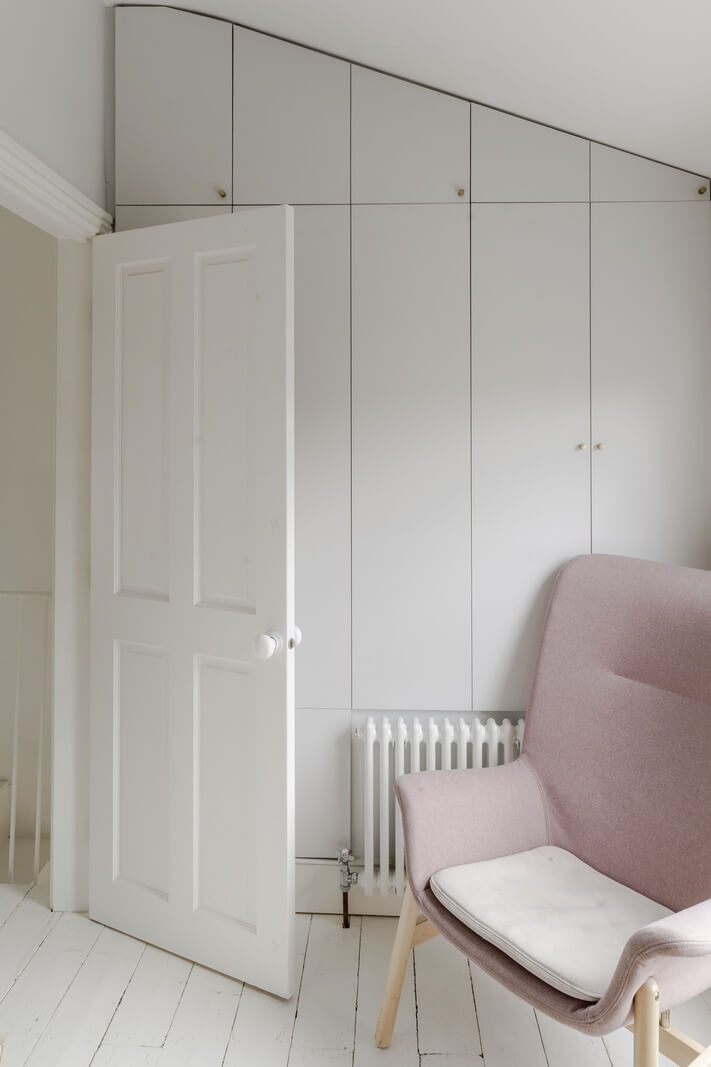 Light and Modern Spaces in a Small Victorian House 16 nursery custom wardrobes under slanted ceiling