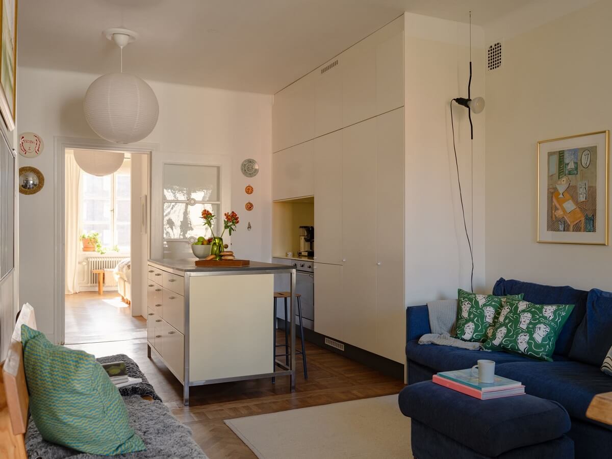 A Stockholm Apartment with Bright Green Color Accents 7 open plan living room kitchen