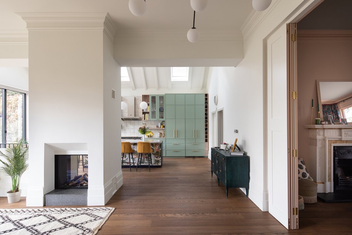 A Colorful London Family Home Renovated by Fraher & Finlay 6 open plan living space with green kitchen