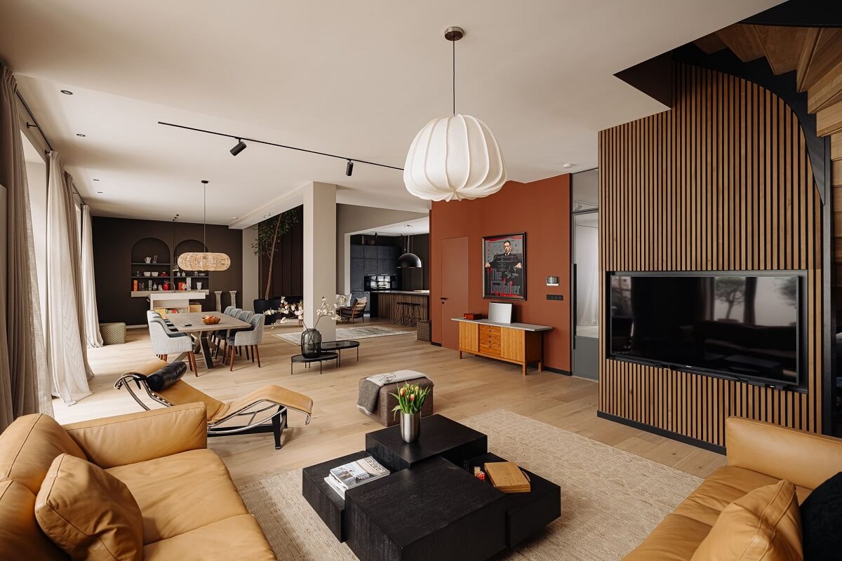 A Modern Garage Conversion in The Netherlands 1 open plan modern living space with wood feature wall
