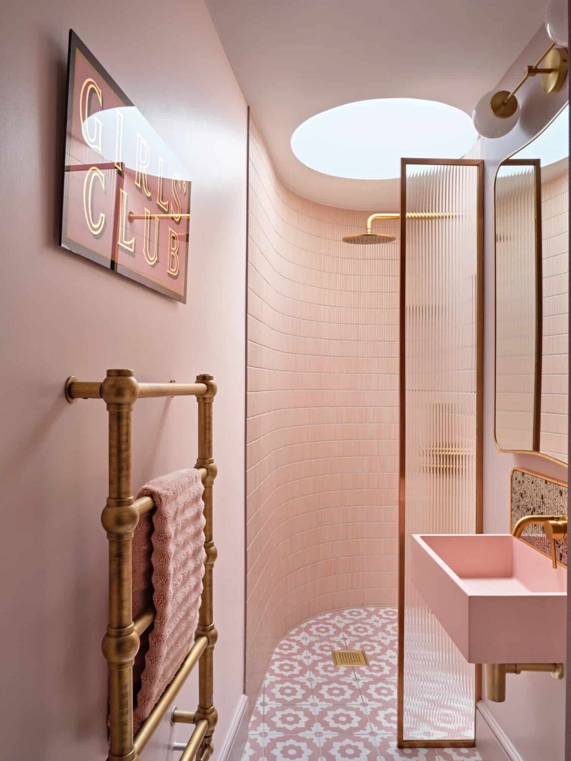 The Best Tile Color for a Small Bathroom 17 pink bathroom with rounded walk in shower and skylight