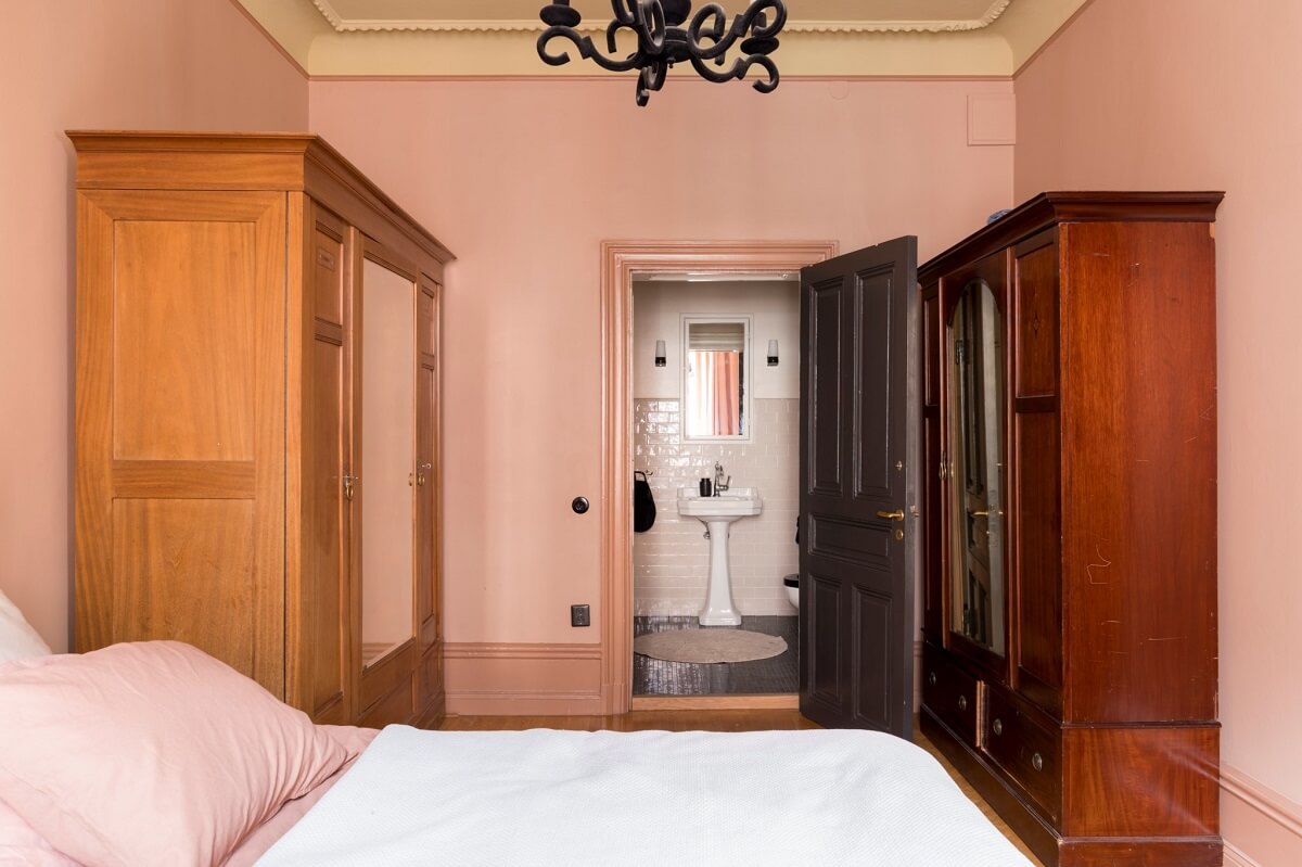 A Pink Apartment with a Black Kitchen 9 pink bedroom with antique wardrobes