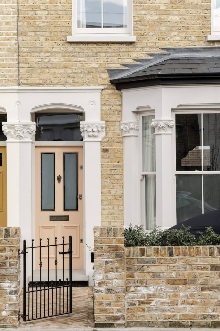 A Light London Family House with a Modern Extension 22 pink front door