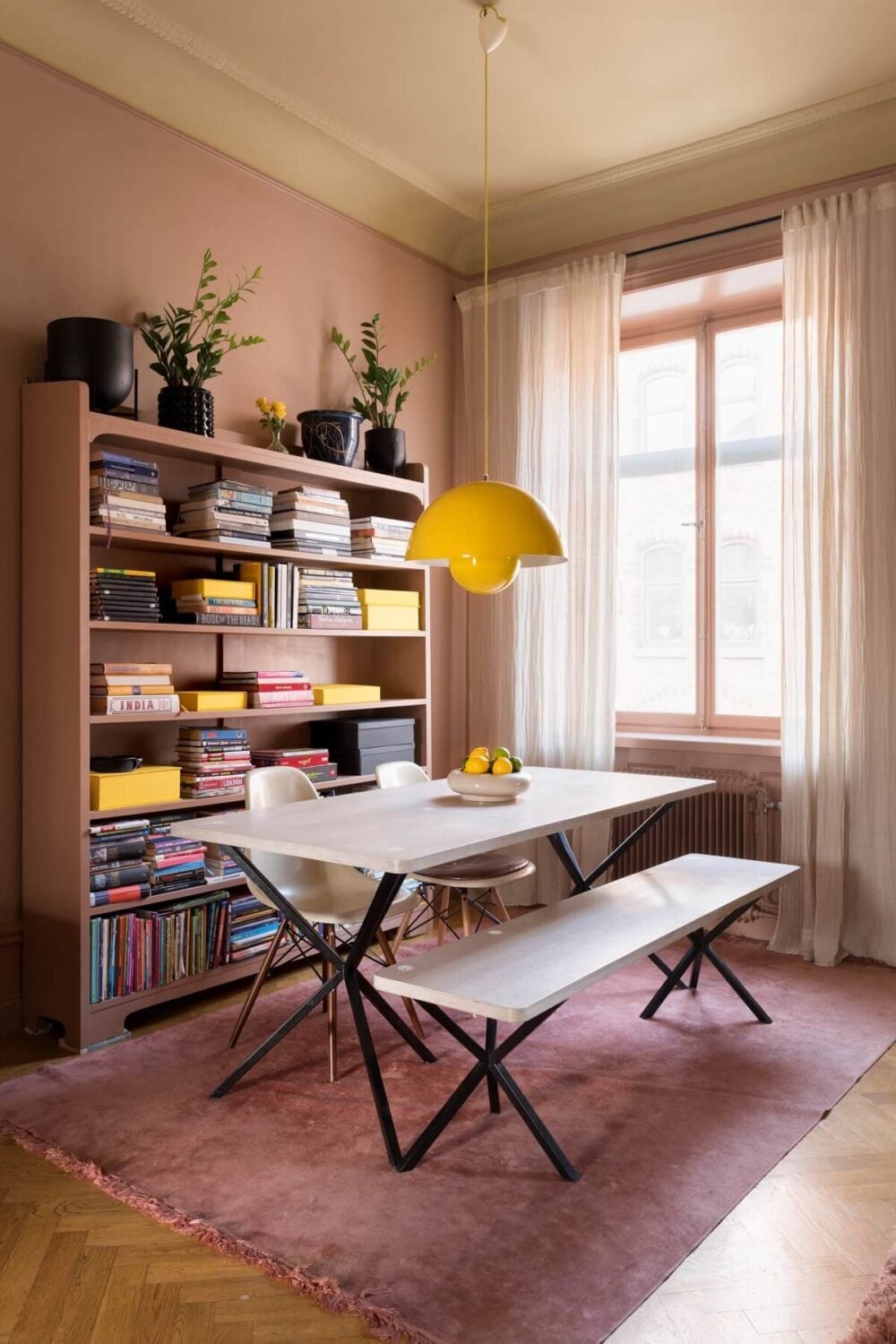 A Pink Apartment with a Black Kitchen 6 pink living room with dining table nordroom