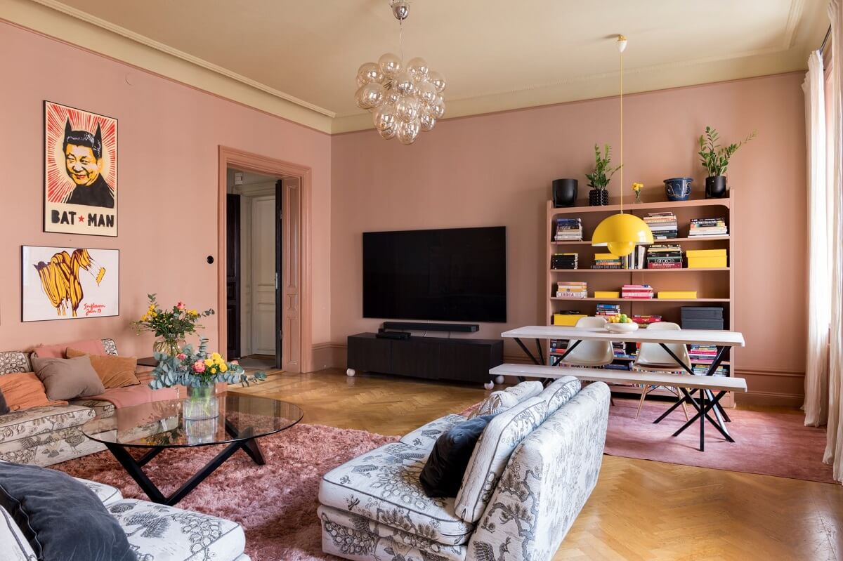 A Pink Apartment with a Black Kitchen 5 pink living room with dining table