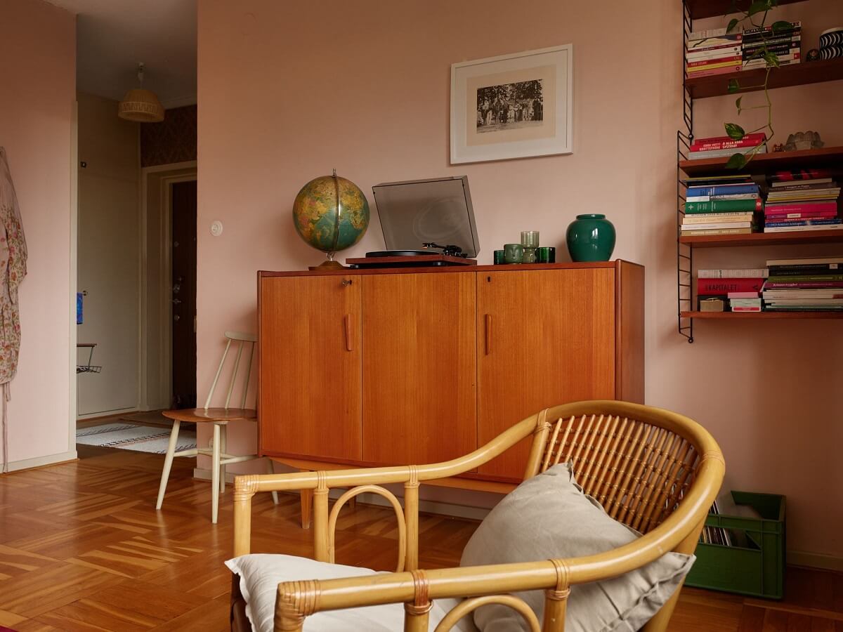 Revisiting a Small Green and Pink Midcentury Apartment 14 pink living room with midcentury furniture