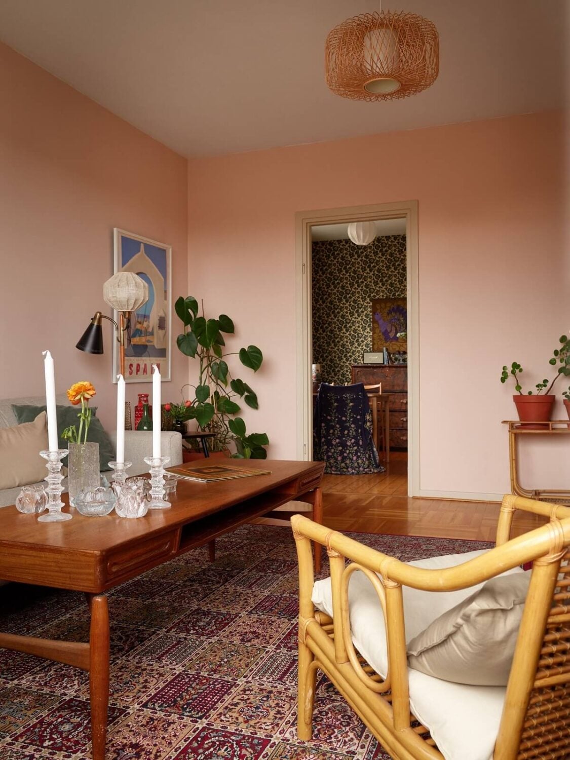 Revisiting a Small Green and Pink Midcentury Apartment 9 pink walls midcentury living room