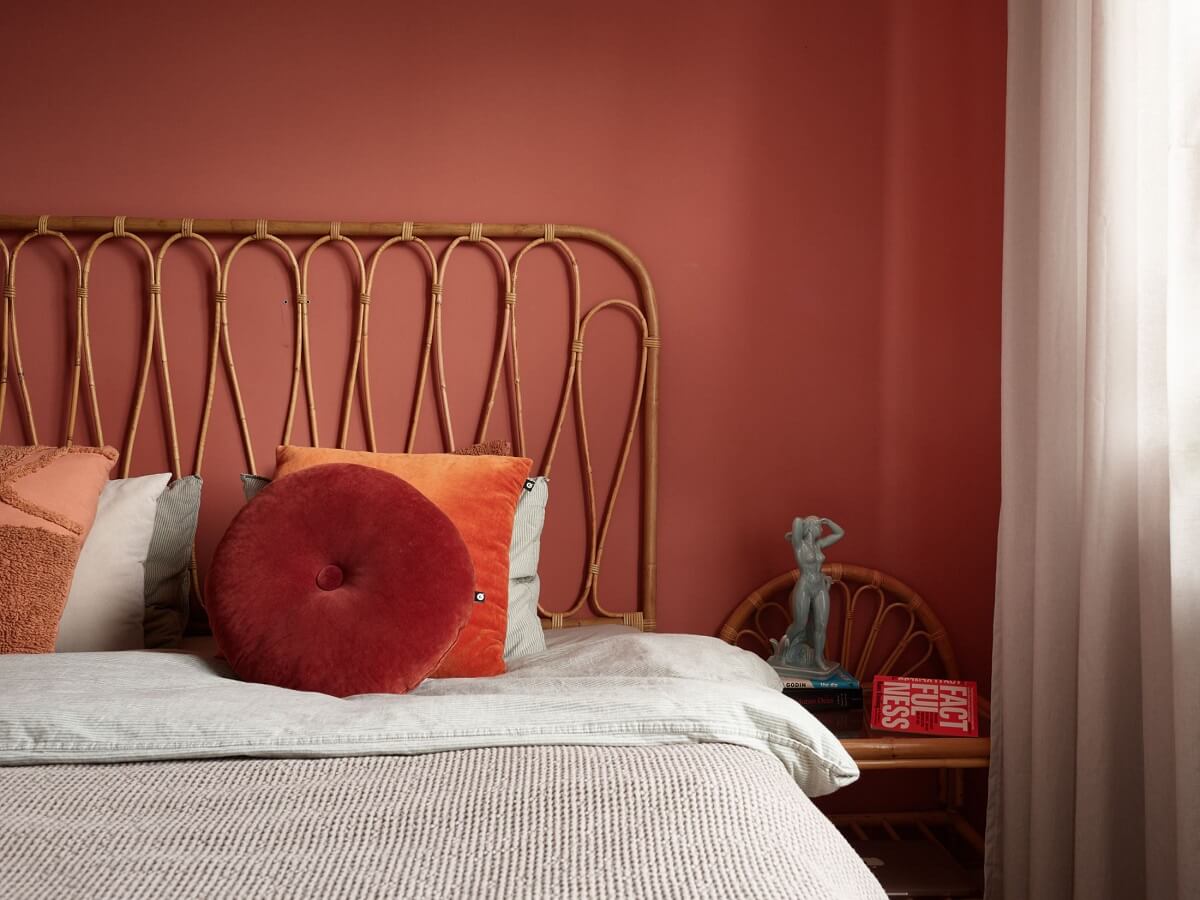 Revisiting a Small Green and Pink Midcentury Apartment 17 rattan headboard