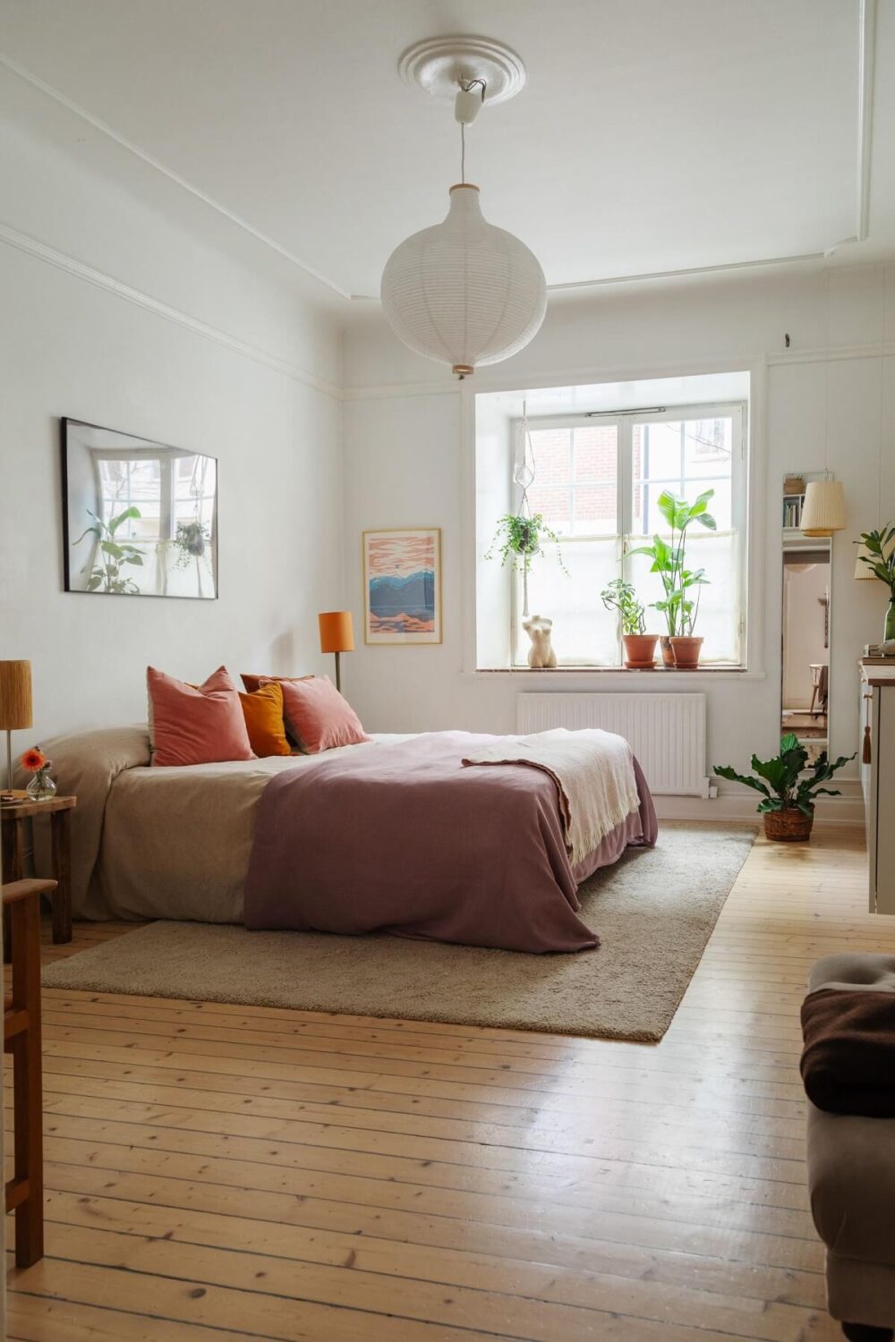 Period Details and Light Rooms in a Scandinavian Apartment 12 scandi bedroom with wooden floor