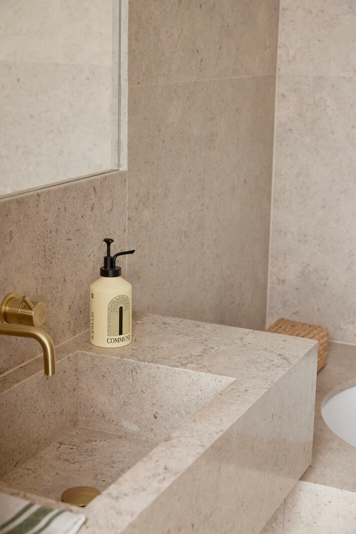 Modern Interiors in an Architectural 19th Century Building 15 sink detail Moleanos Azul limestone