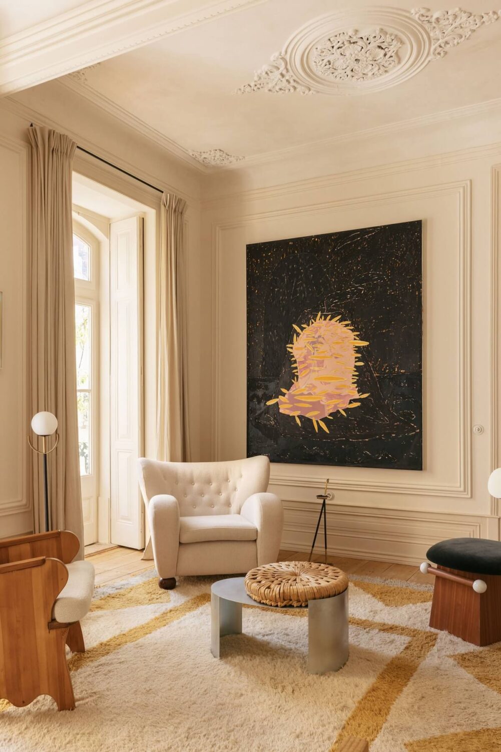 The Gallery Home: A Custom-Built Design Apartment in Portugal 4 sitting room with high ceilings and period features