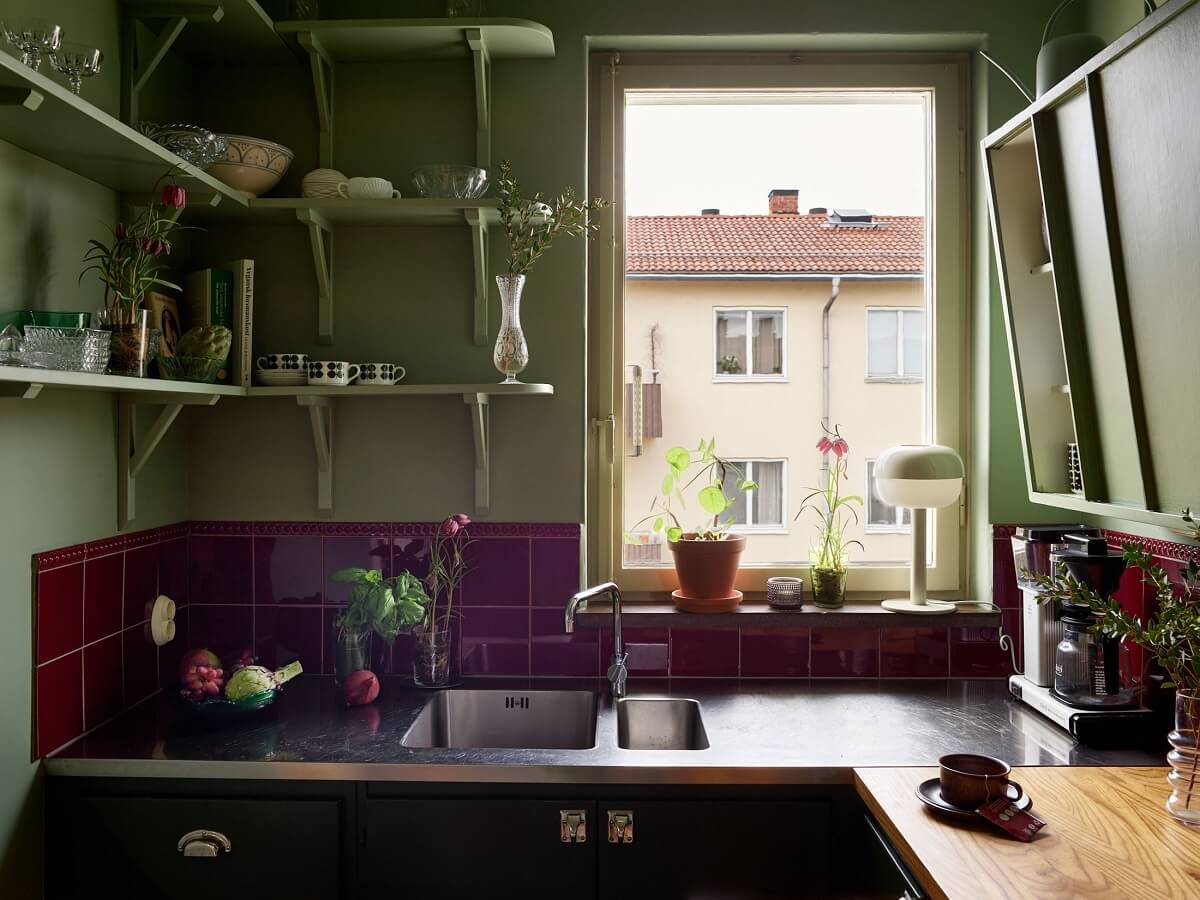 Revisiting a Small Green and Pink Midcentury Apartment 3 small green midcentury kitchen with shelves and pink tiles