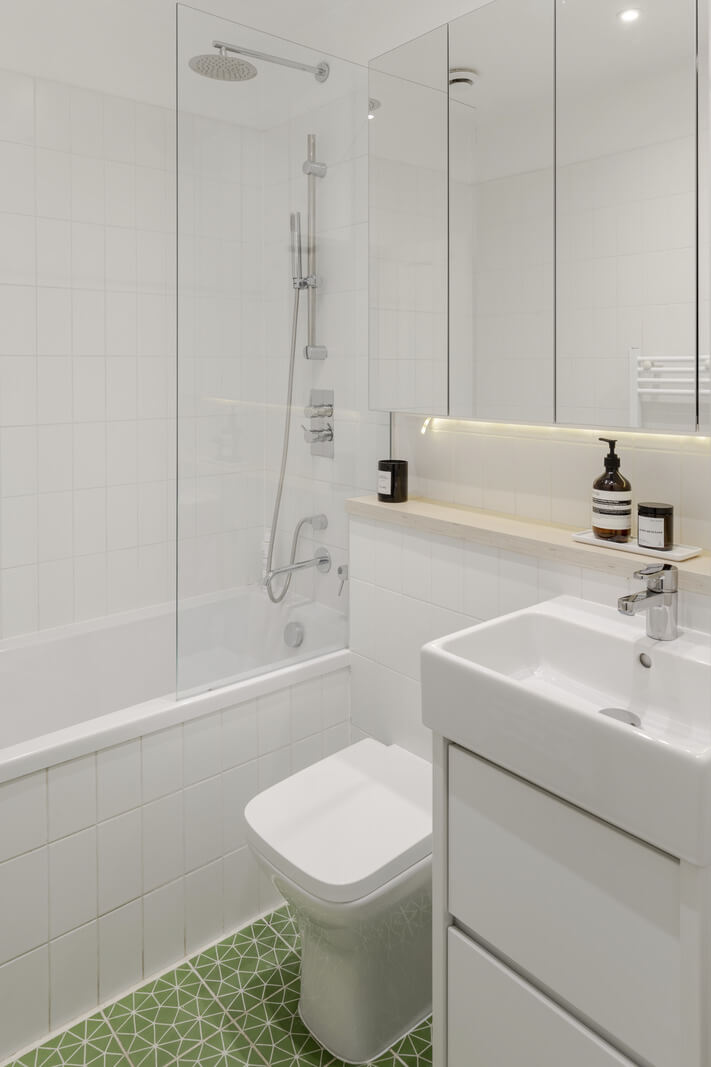 Light and Modern Spaces in a Small Victorian House 18 small white bedroom green floor tiles