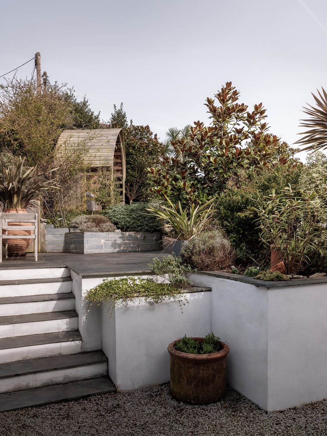 A Coastal White Painter's Home with Reclaimed Features in Cornwall 23 split level garden