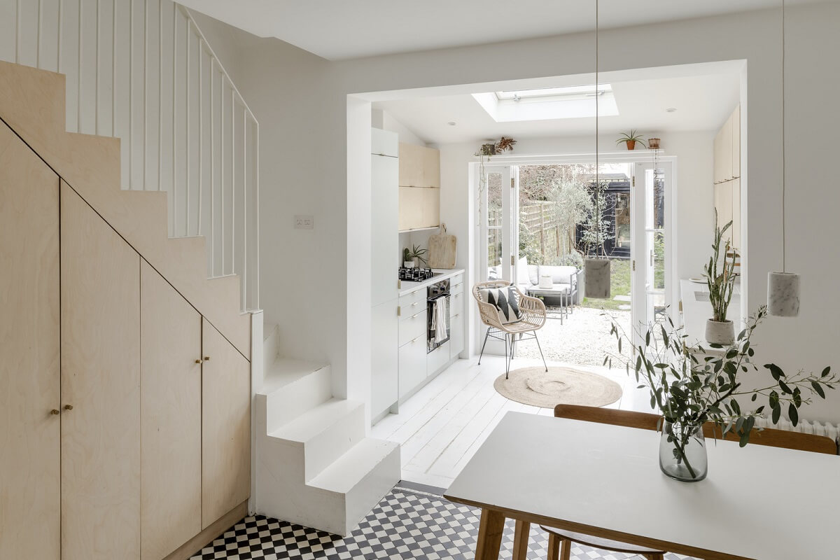 Light and Modern Spaces in a Small Victorian House 9 staircase with cupboards