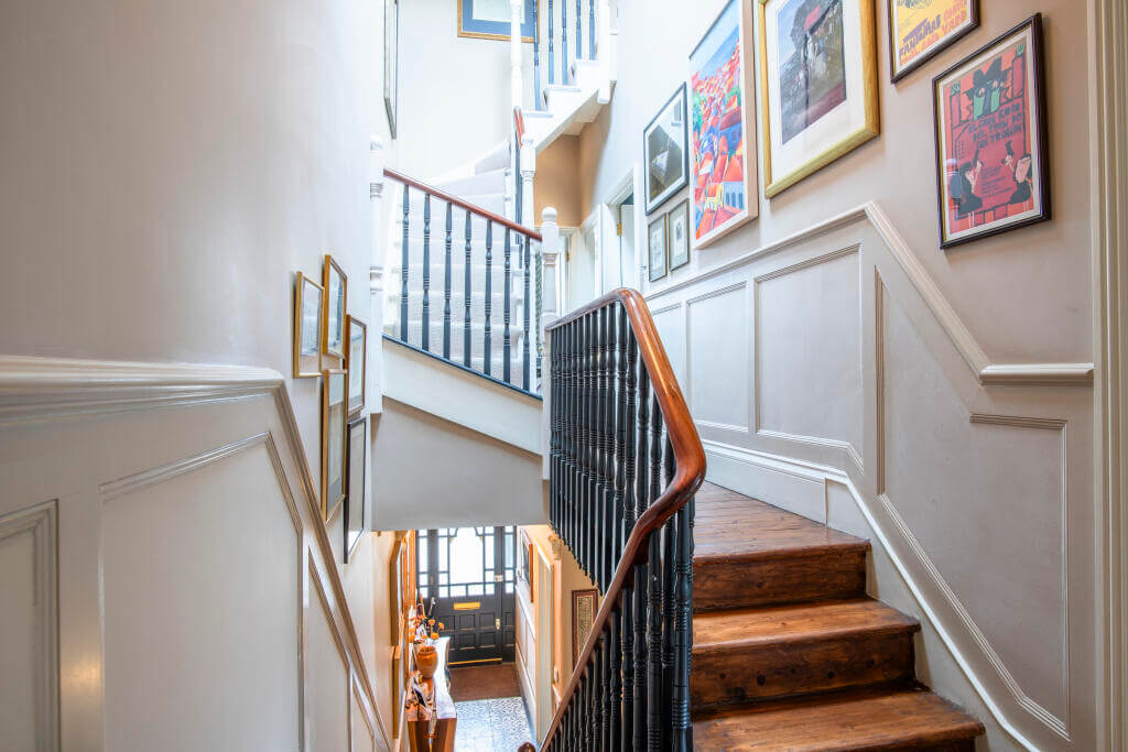 A Victorian House where the Kitchen is the Heart of the Home 9 staircase with gallery wall