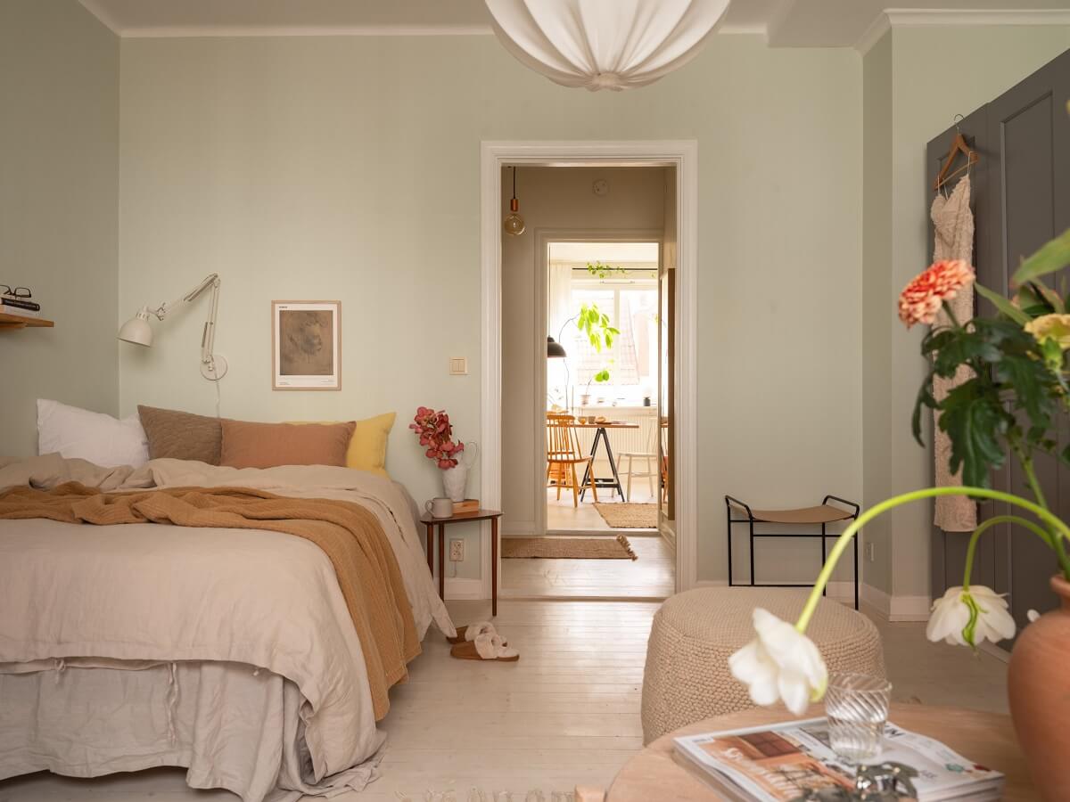 Calm Color Tones in a Light Scandinavian Studio Apartment 5 studio apartment with earthy bedding