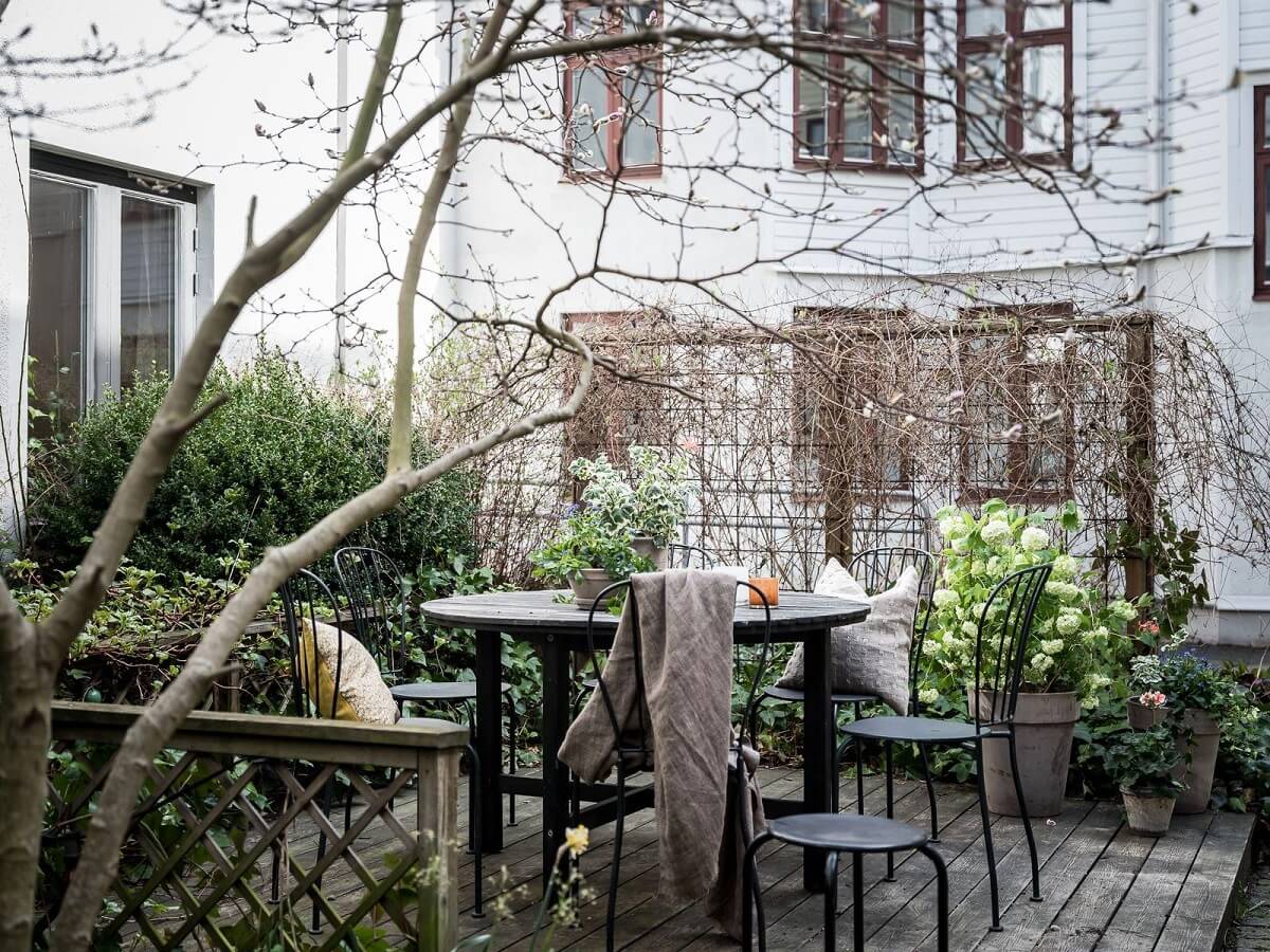 A Scandinavian Apartment with a Rust Red Bedroom 20 terrace 2 A Scandinavian Apartment with a Rust Red Bedroom