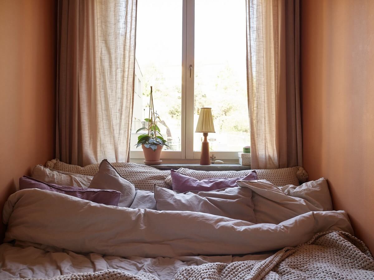 A Swedish Apartment with a Tiny Terracotta Brown Bedroom 15 tiny bedroom with brown terracotta walls
