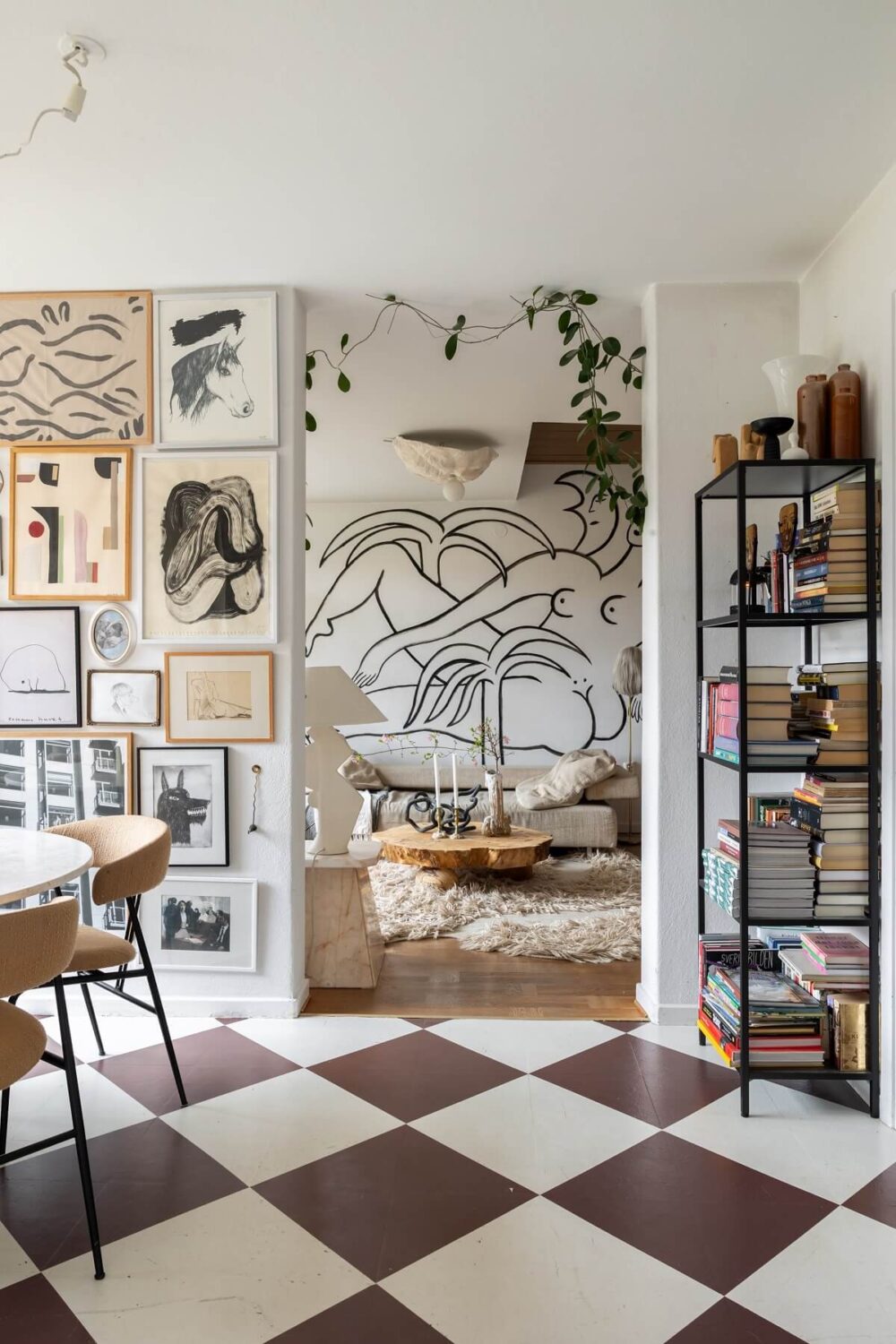 A Swedish Family House with Wall Murals and Art 6 view into living room