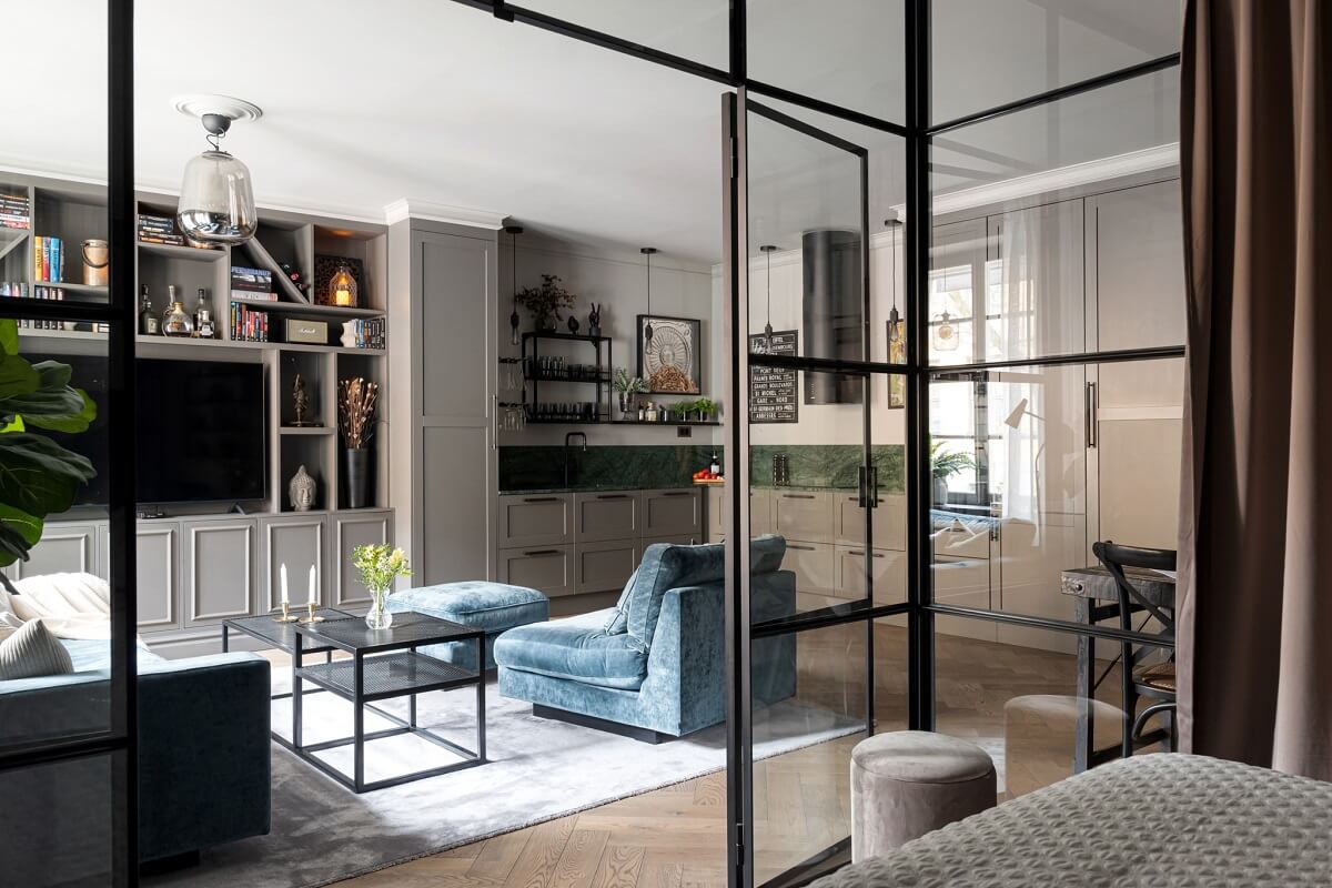 A Gray Apartment with an Industrial Glass Bedroom 15 view into living room